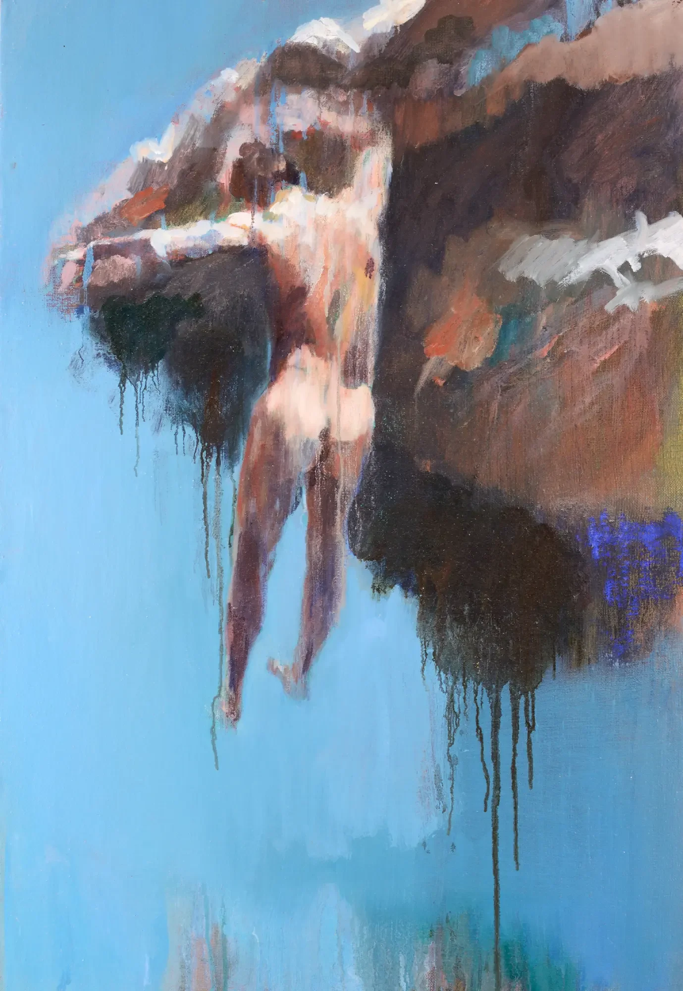 Male figure dissolving while falling toward an intense blue sea